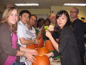 ILI students carving pumpkins